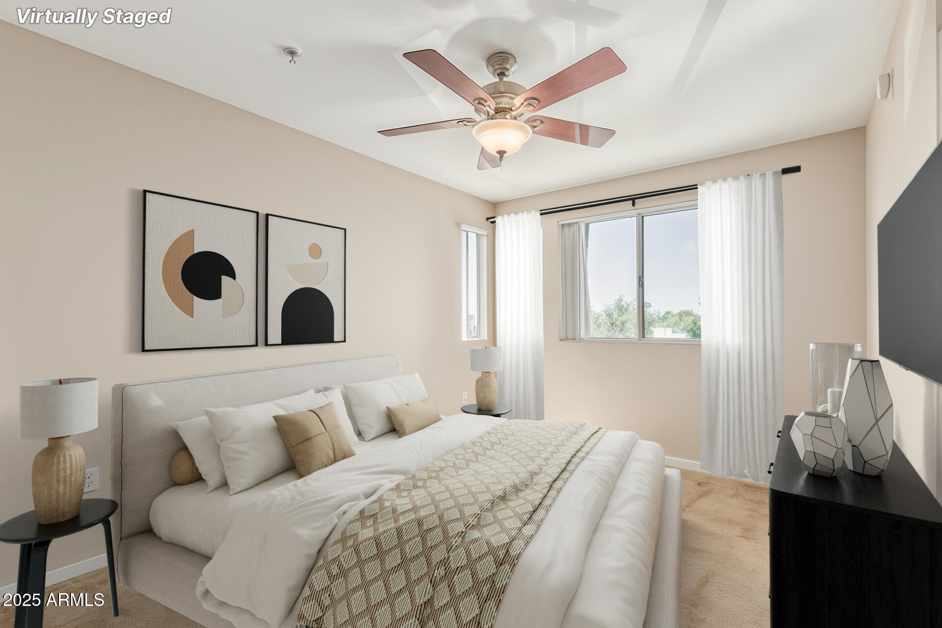 3633 North 3rd Avenue, Unit 2083 Phoenix, AZ 85013 - Photo 24 of 54 a bedroom with a large bed and a chandelier