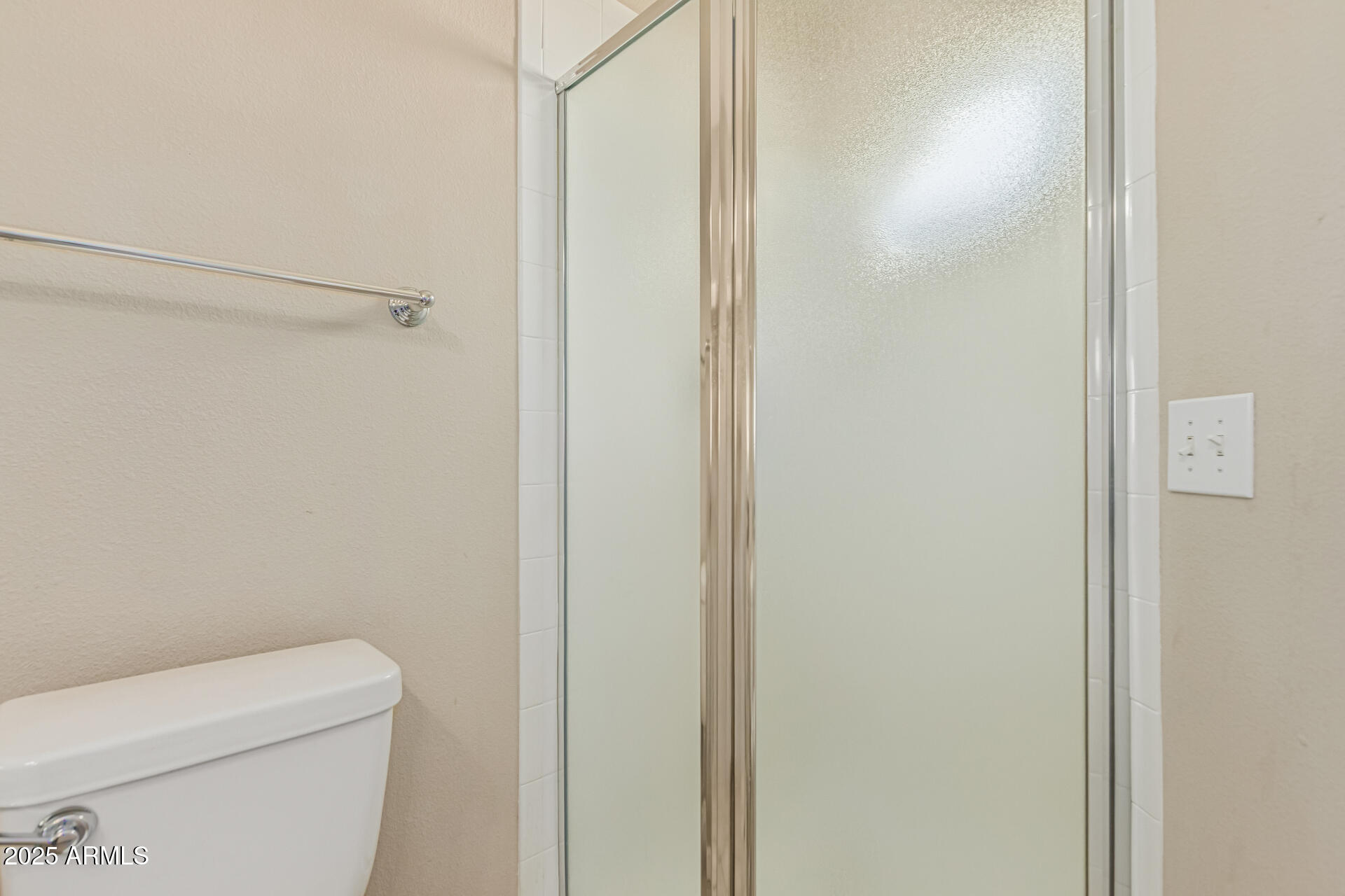 3633 North 3rd Avenue, Unit 2083 Phoenix, AZ 85013 - Photo 29 of 54 a bathroom with a toilet and a shower