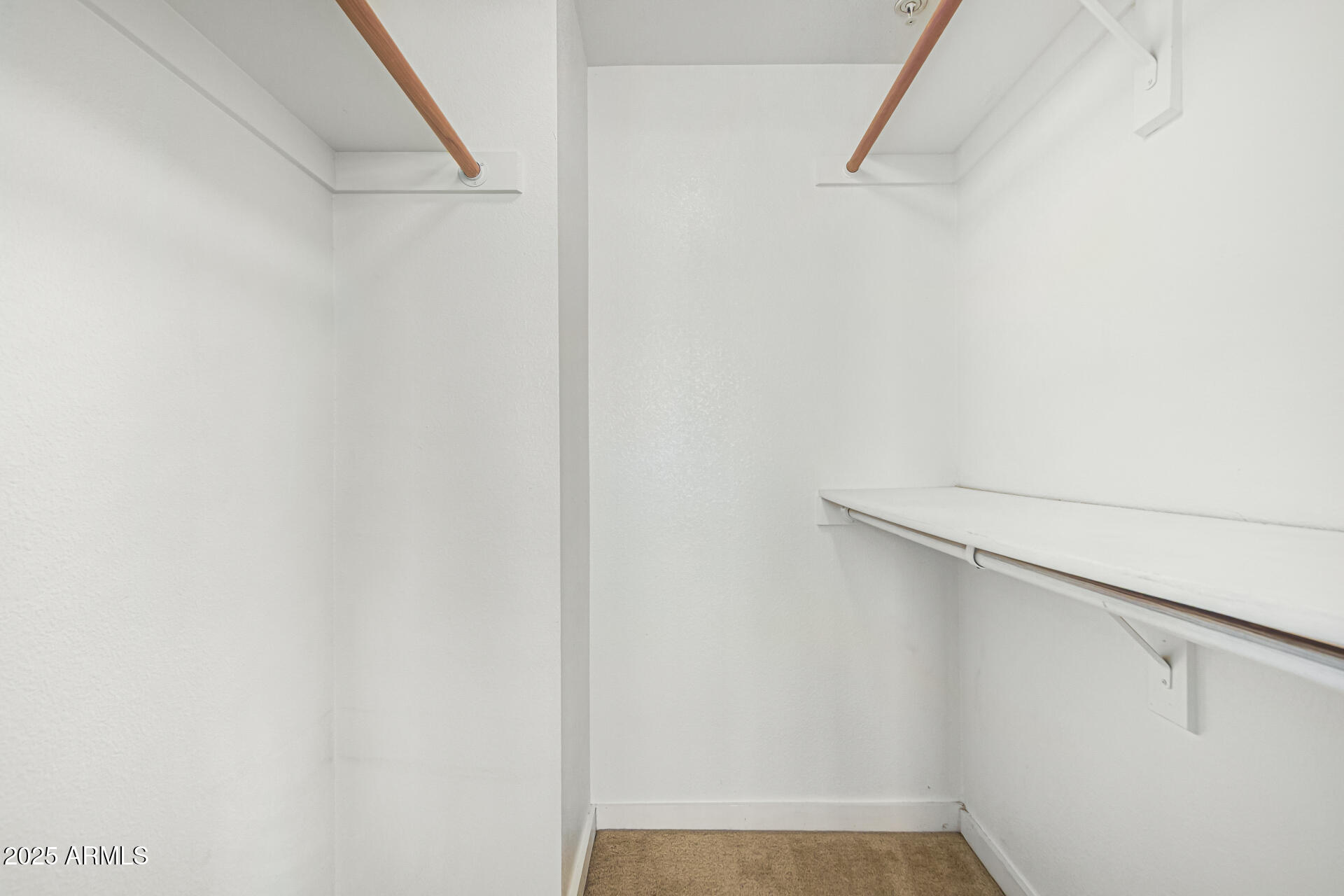 3633 North 3rd Avenue, Unit 2083 Phoenix, AZ 85013 - Photo 38 of 54 a view of small space with racks on the wall