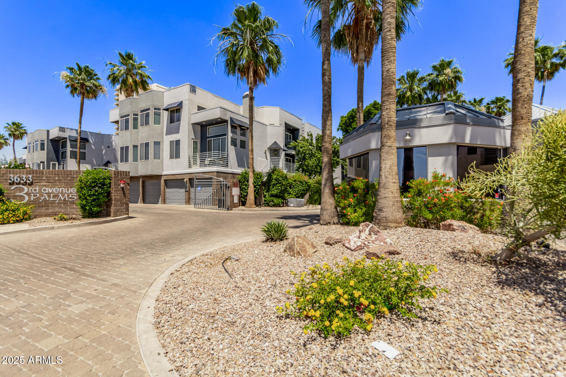 3633 North 3rd Avenue, Unit 2083 Phoenix, AZ 85013 - Photo 4 of 54 a front view of multiple houses with palm trees