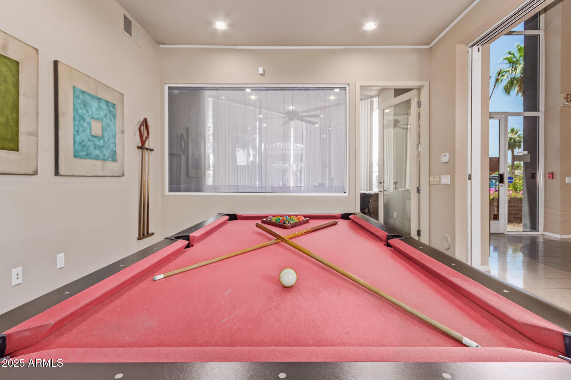 3633 North 3rd Avenue, Unit 2083 Phoenix, AZ 85013 - Photo 44 of 54 a room with pool table and windows