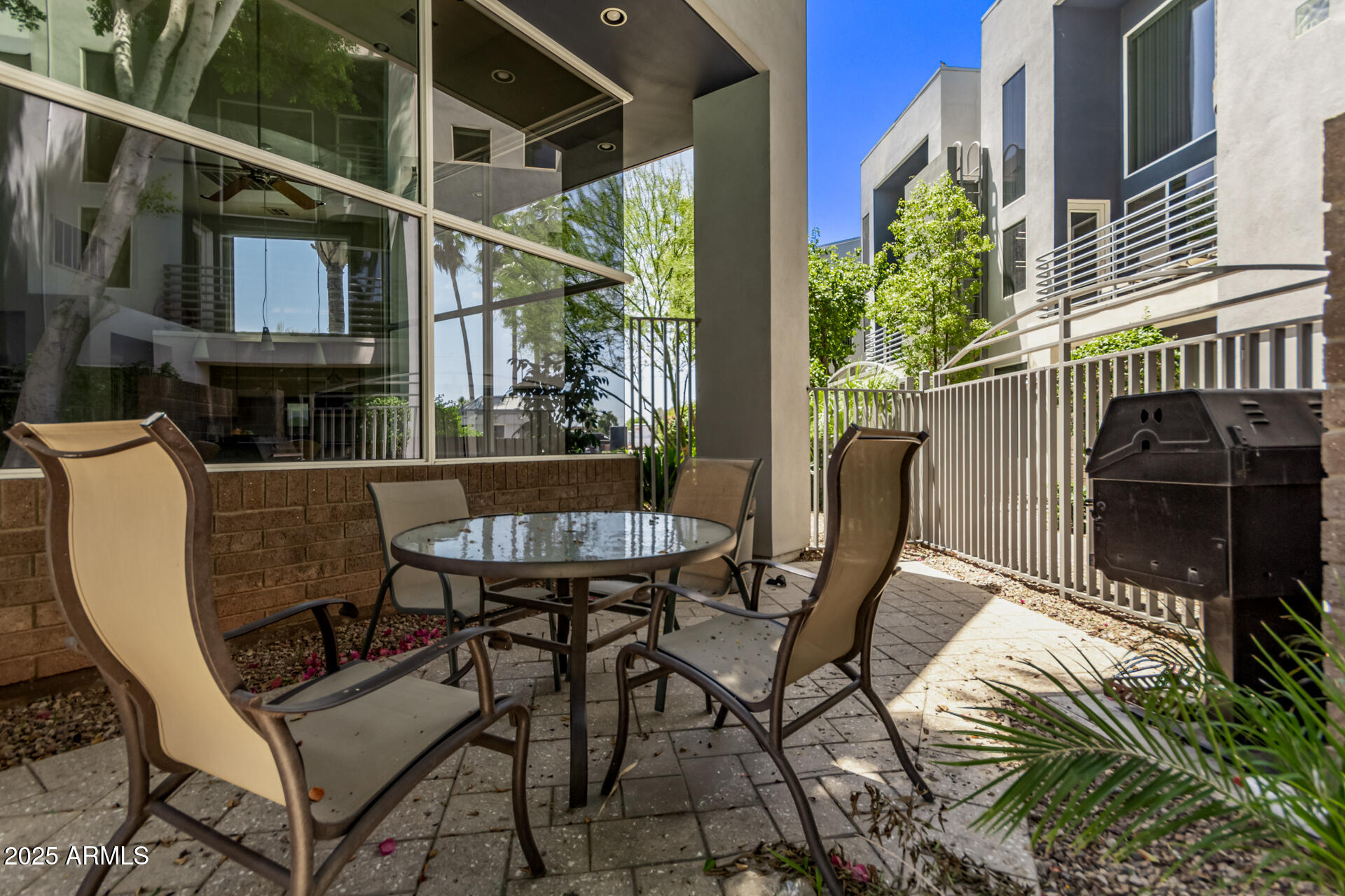 3633 North 3rd Avenue, Unit 2083 Phoenix, AZ 85013 - Photo 45 of 54 a view of a chairs and table in the balcony
