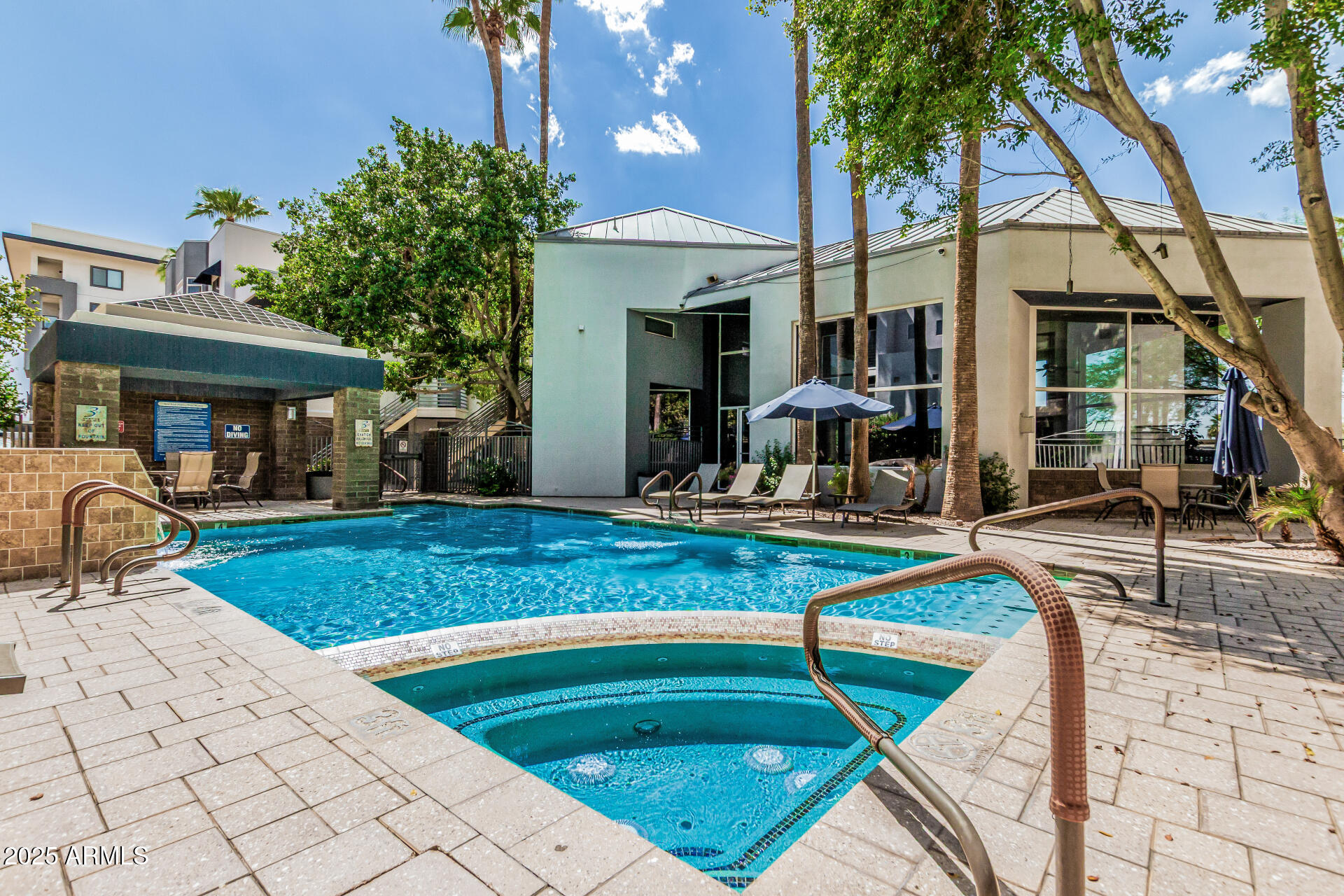 3633 North 3rd Avenue, Unit 2083 Phoenix, AZ 85013 - Photo 50 of 54 a view of a house with swimming pool and sitting area