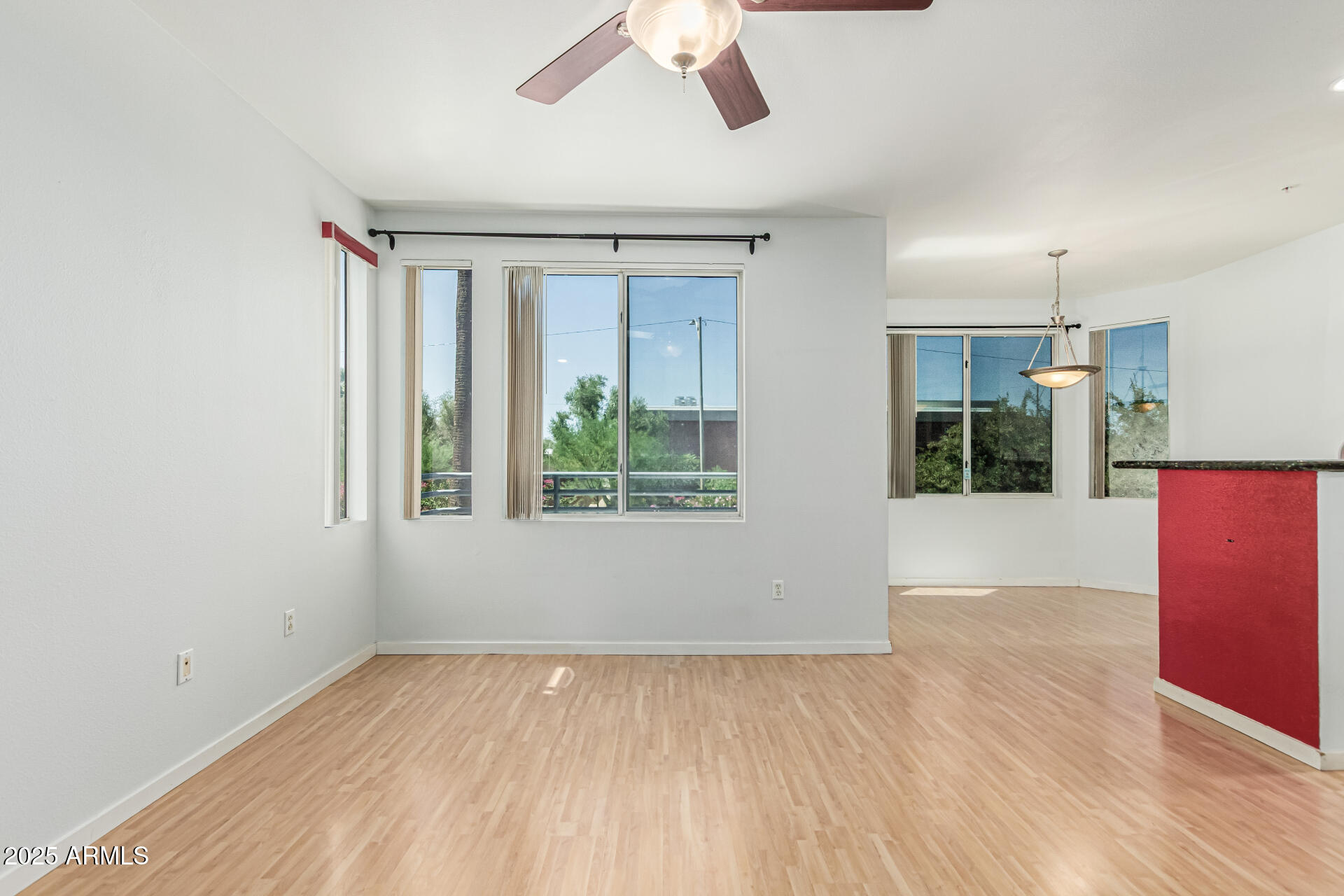 3633 North 3rd Avenue, Unit 2083 Phoenix, AZ 85013 - Photo 10 of 54 a view of an empty room with a window