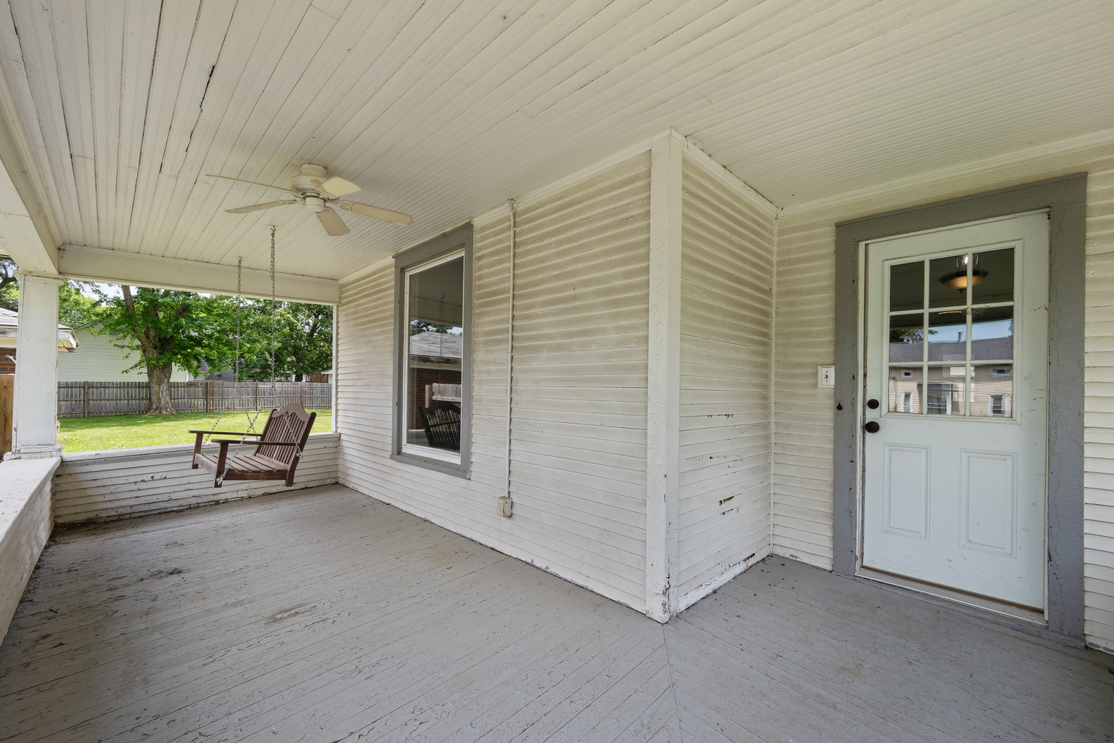 1202 20th Avenue Viola, IL 61486 - Photo 12 of 50 an empty room with windows and outdoor view