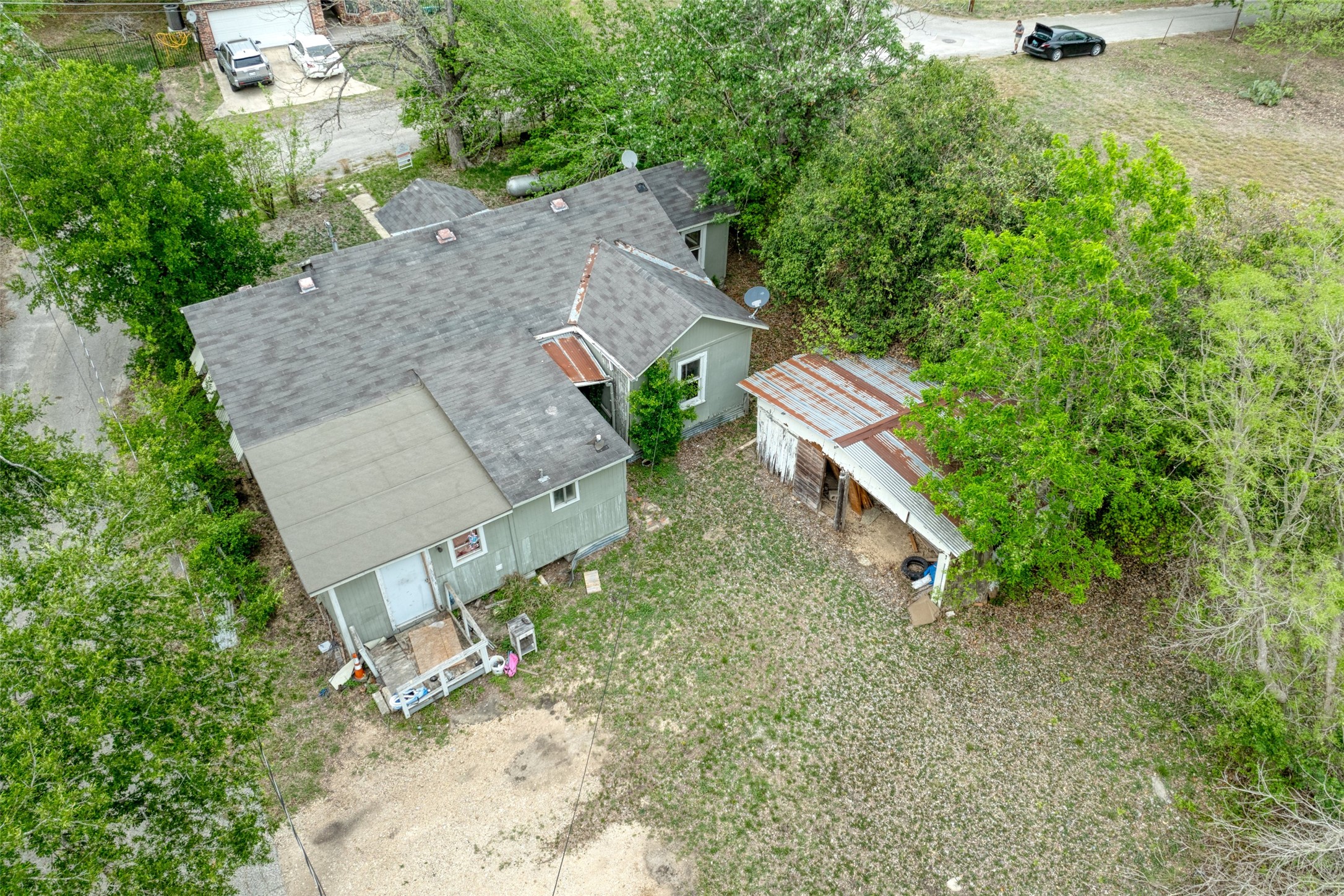 1006 Proctor Street Lockhart, TX 78644 - Photo 15 of 24 an aerial view of a house with a yard