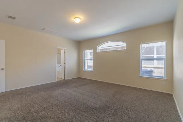 an empty room with windows