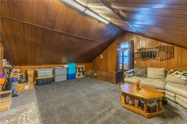 a view of a room with furniture