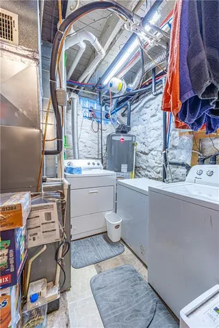 a view of a chair and table in backyard
