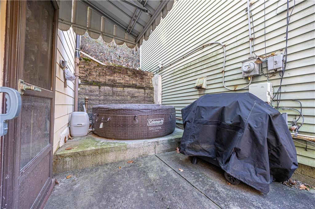 3318 Spring Garden Road Pittsburgh, PA 15212 - Photo 18 of 22 a view of a chair and table in backyard