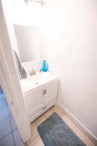 a bathroom with a toilet and a sink