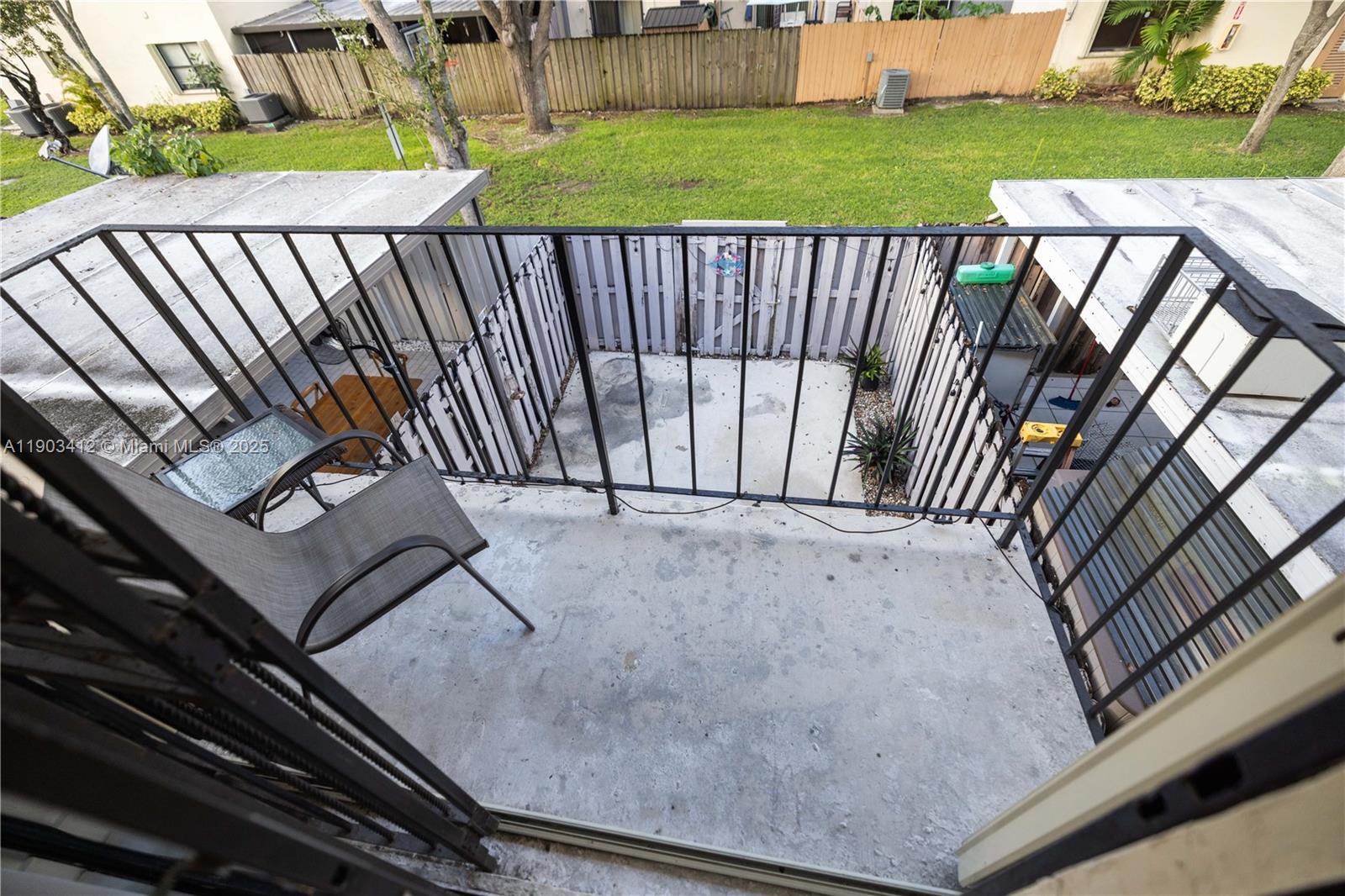 12955 Southwest 66th Lane, Unit 2092 Miami, FL 33183 - Photo 30 of 46 a view of a backyard and a park