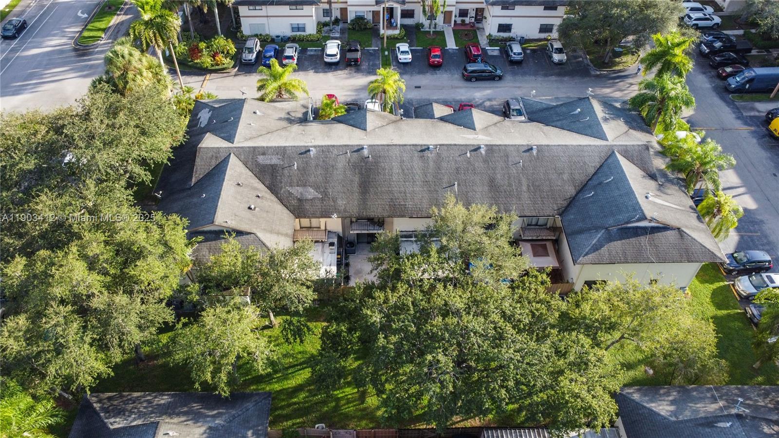 12955 Southwest 66th Lane, Unit 2092 Miami, FL 33183 - Photo 7 of 46 an aerial view of a house with outdoor seating