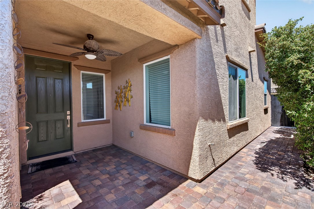 1824 Redland Ridge Street Henderson, NV 89002 - Photo 20 of 69 A welcoming paver patio leads to the front door of this charming residence.