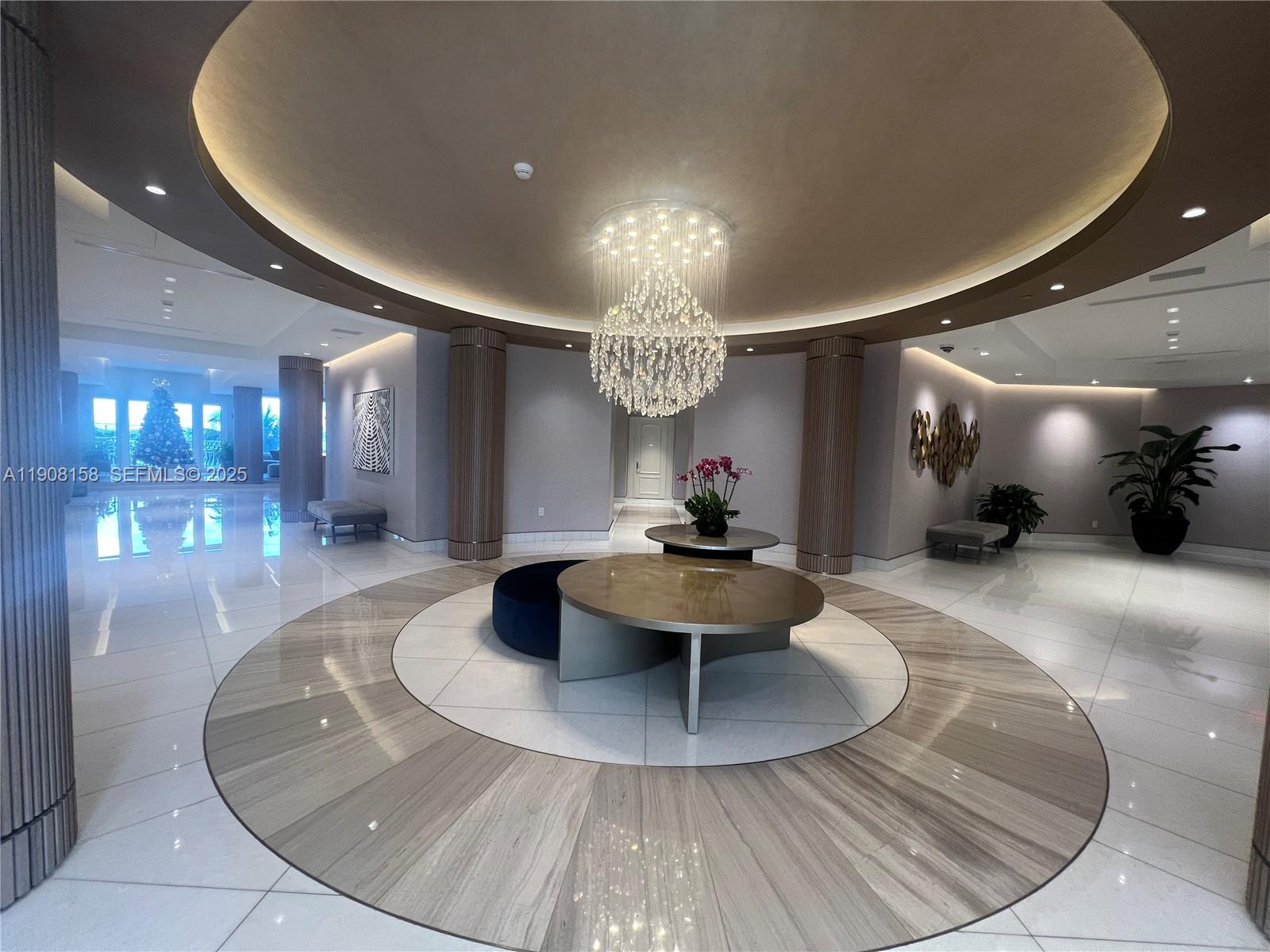 888 Brickell Key Drive, Unit 806 Miami, FL 33131 - Photo 16 of 20 a view of a living room and dining room