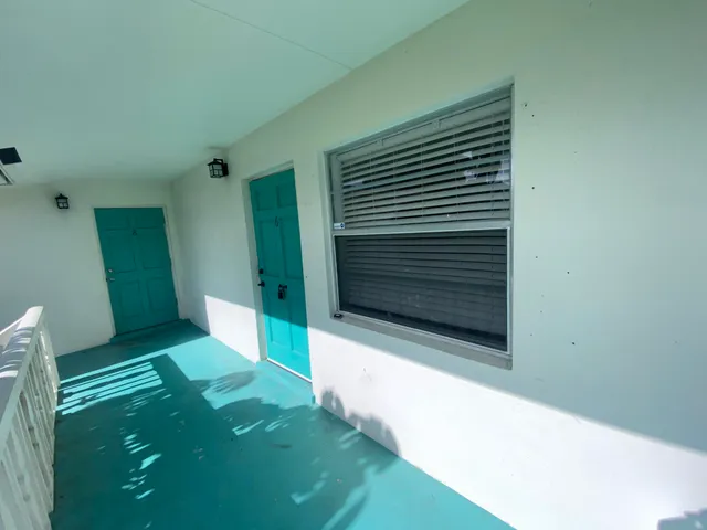 a view of backyard with a small cabin