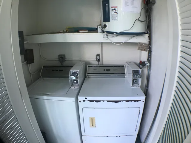 a kitchen with a stove and a refrigerator