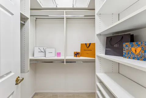 a kitchen with a sink and a refrigerator