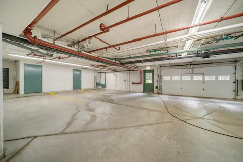 a view of a building with a garage