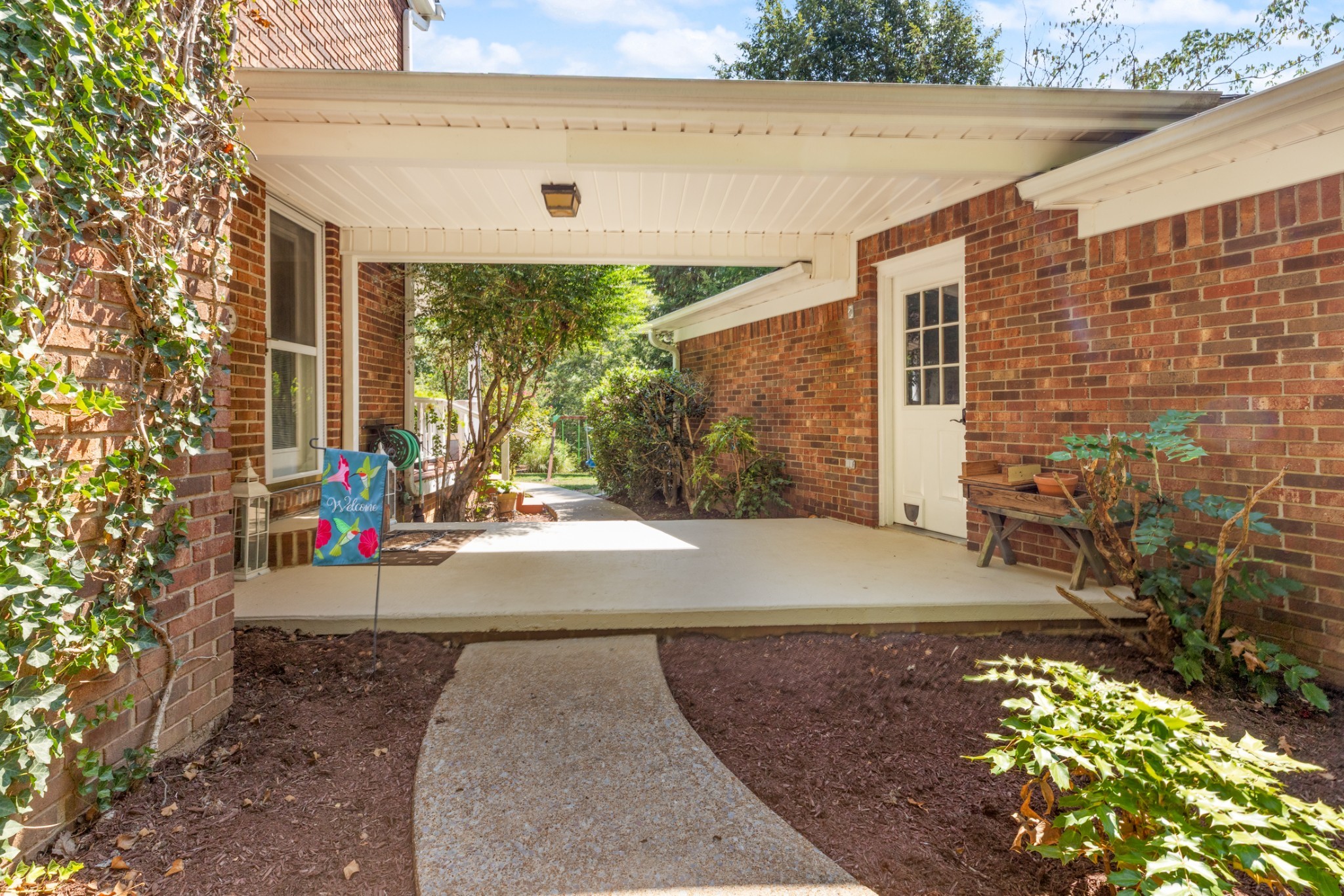 7422 Indian Creek Road McEwen, TN 37101 - Photo 15 of 86 a view of a patio with table and chairs and potted plants