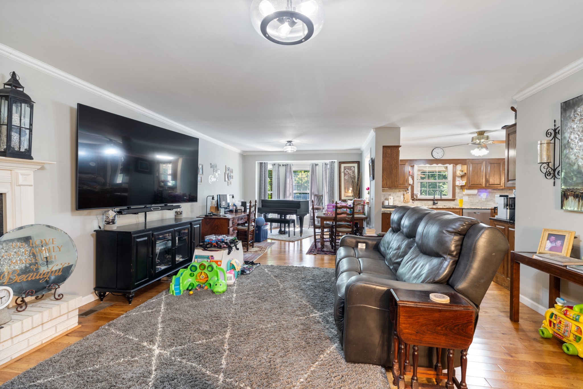 7422 Indian Creek Road McEwen, TN 37101 - Photo 19 of 86 a living room with furniture and a flat screen tv