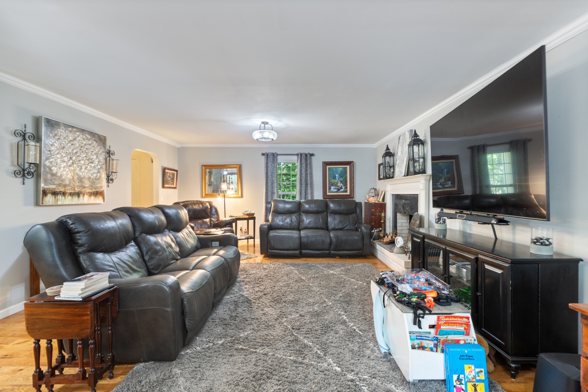 7422 Indian Creek Road McEwen, TN 37101 - Photo 20 of 86 a living room with furniture and a flat screen tv
