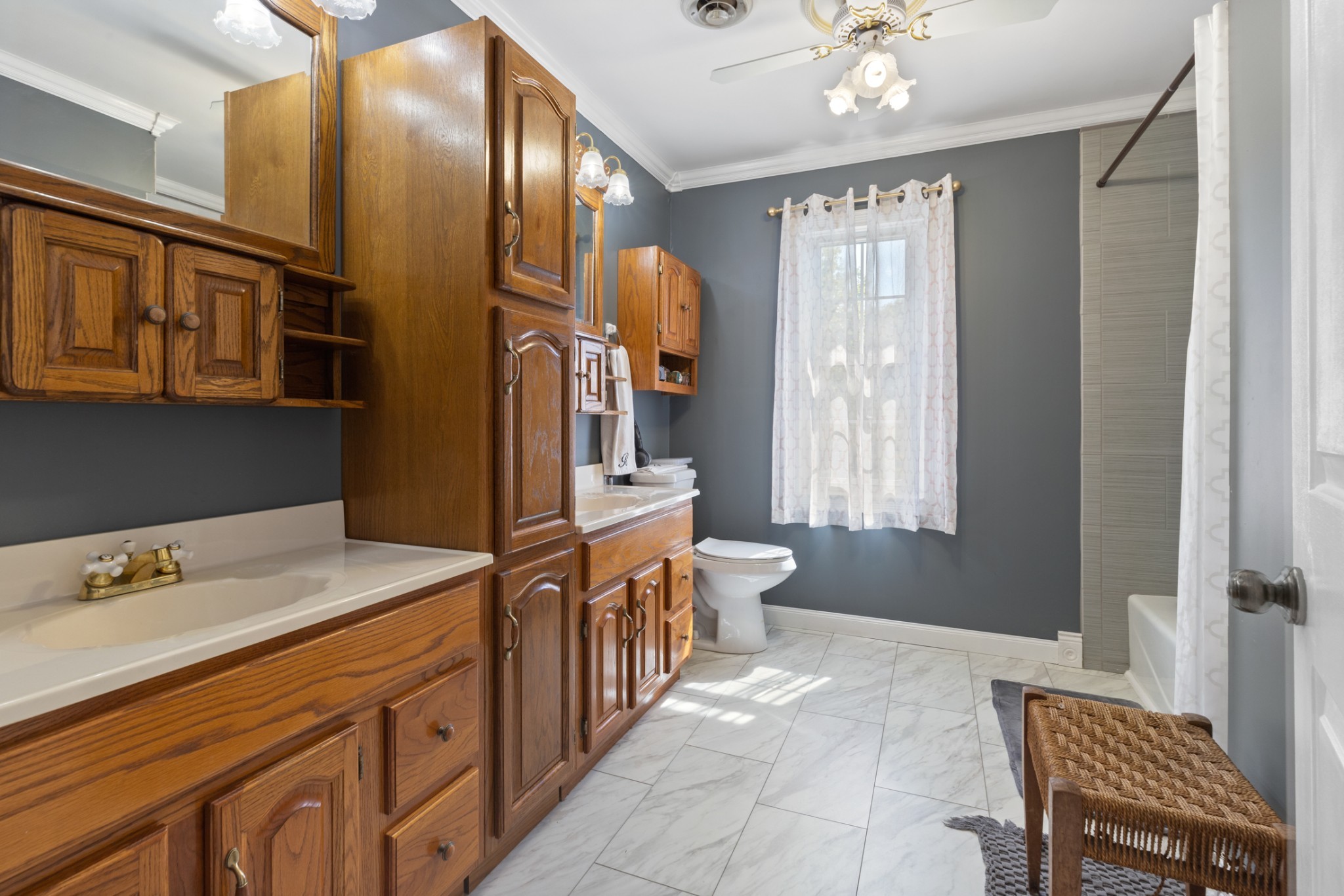 7422 Indian Creek Road McEwen, TN 37101 - Photo 38 of 86 a spacious bathroom with a sink a mirror and a bathtub