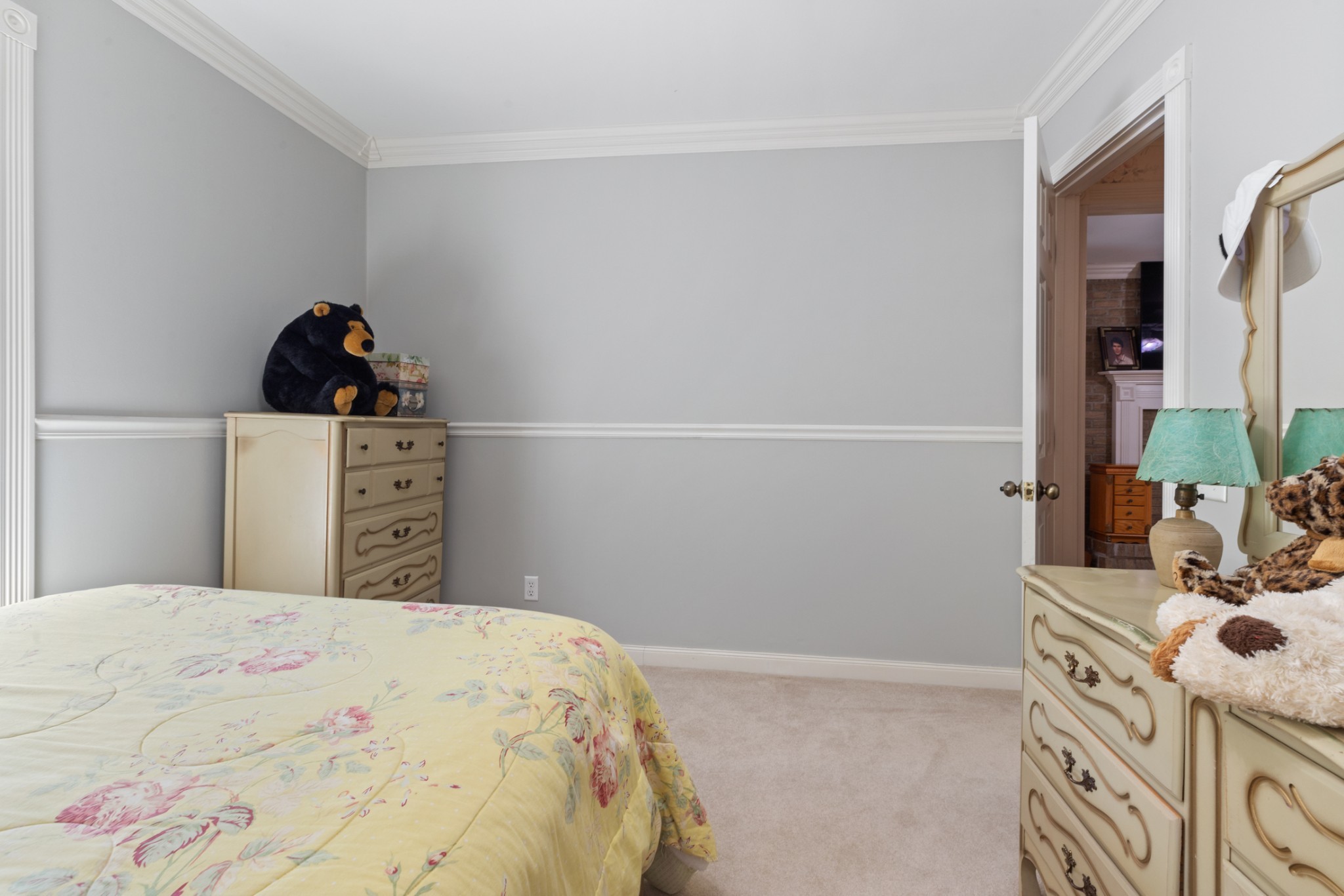 7422 Indian Creek Road McEwen, TN 37101 - Photo 40 of 86 a bedroom with a bed and a dresser