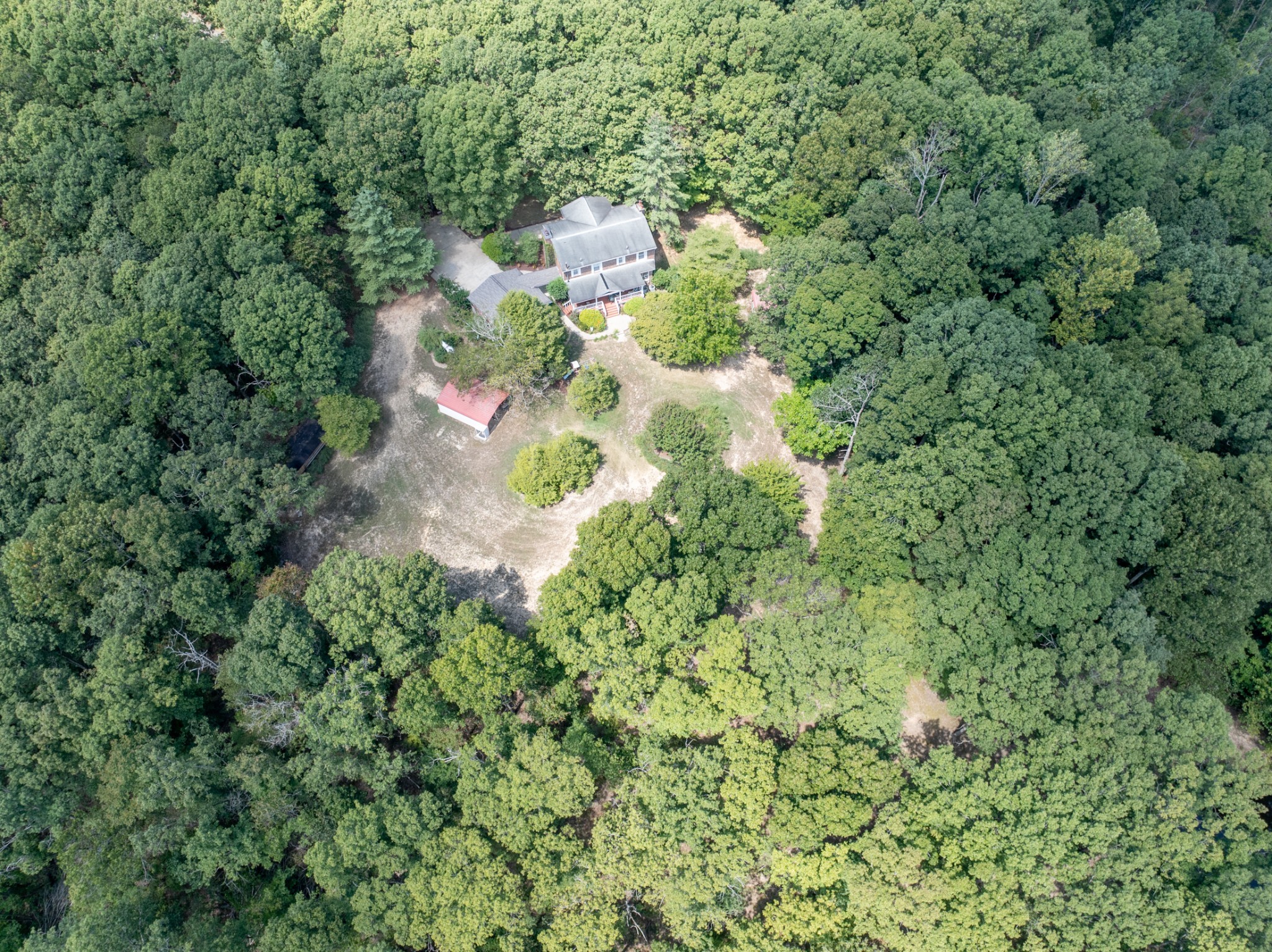 7422 Indian Creek Road McEwen, TN 37101 - Photo 61 of 86 an aerial view of residential house with outdoor space and trees all around
