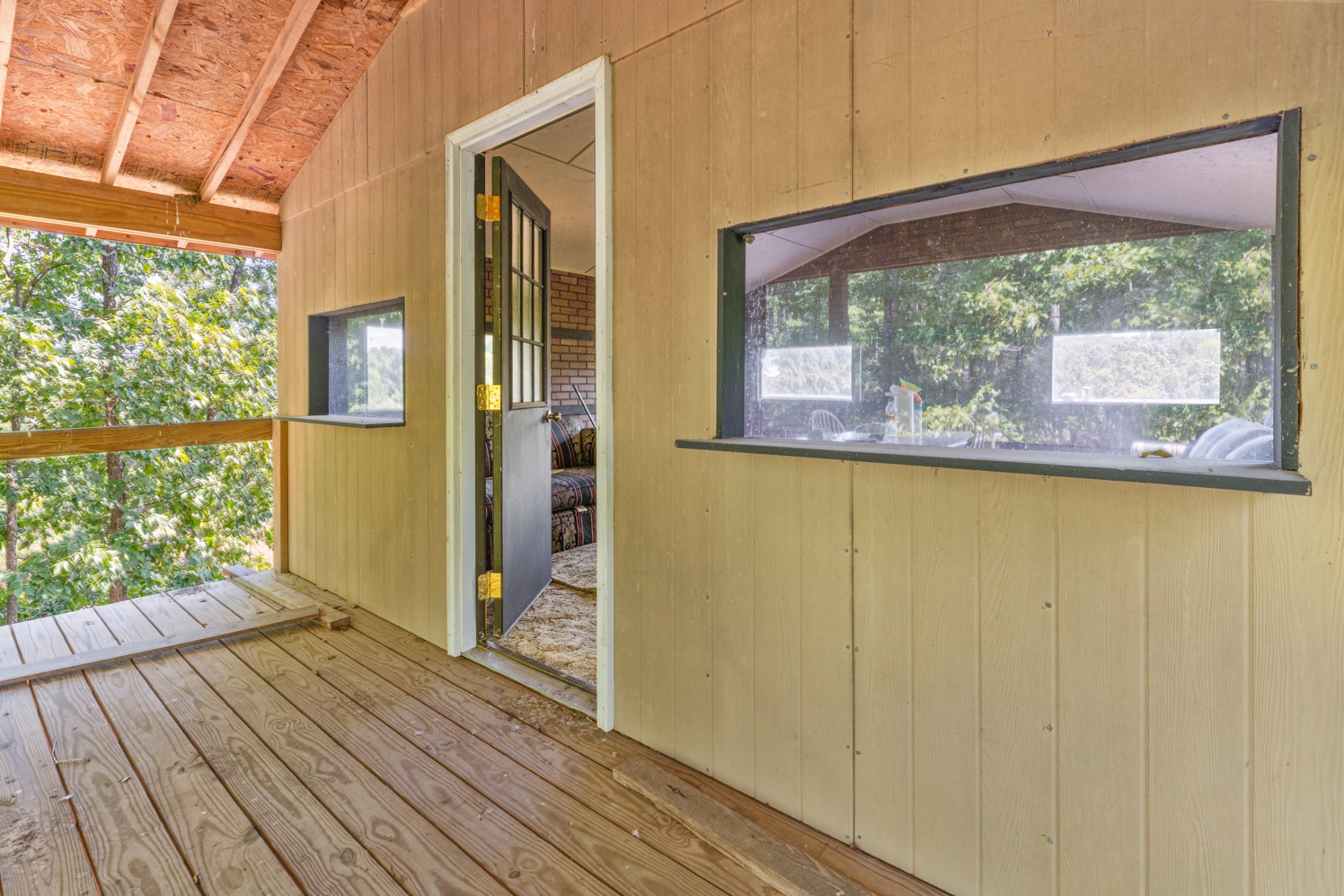 7422 Indian Creek Road McEwen, TN 37101 - Photo 62 of 86 a view of a room with wooden floor and doors
