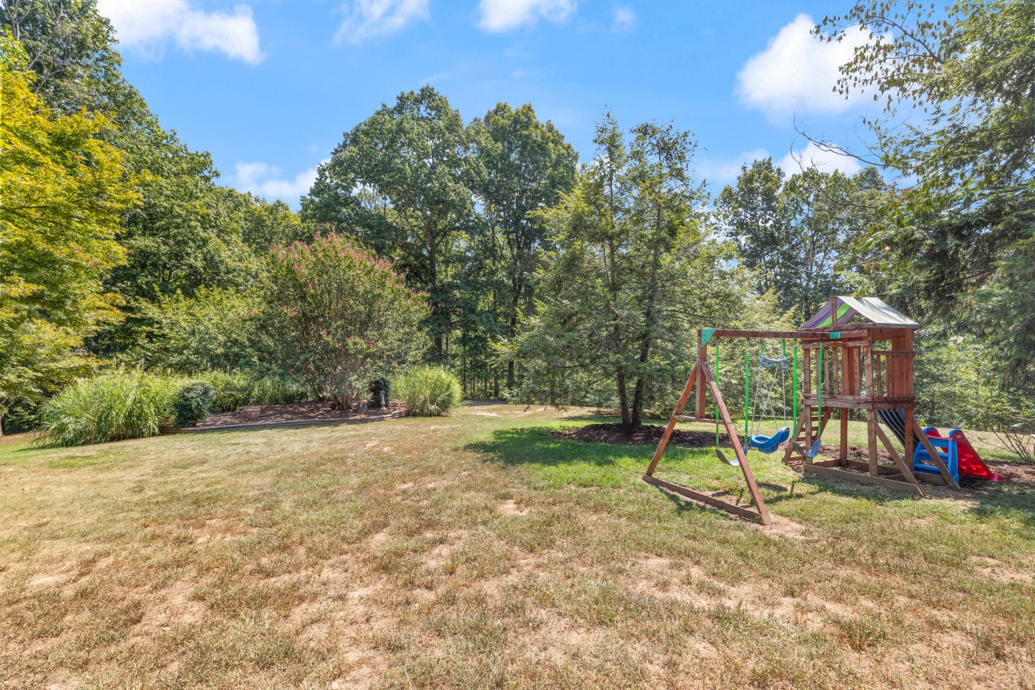7422 Indian Creek Road McEwen, TN 37101 - Photo 66 of 86 a view of a park with swings and slides