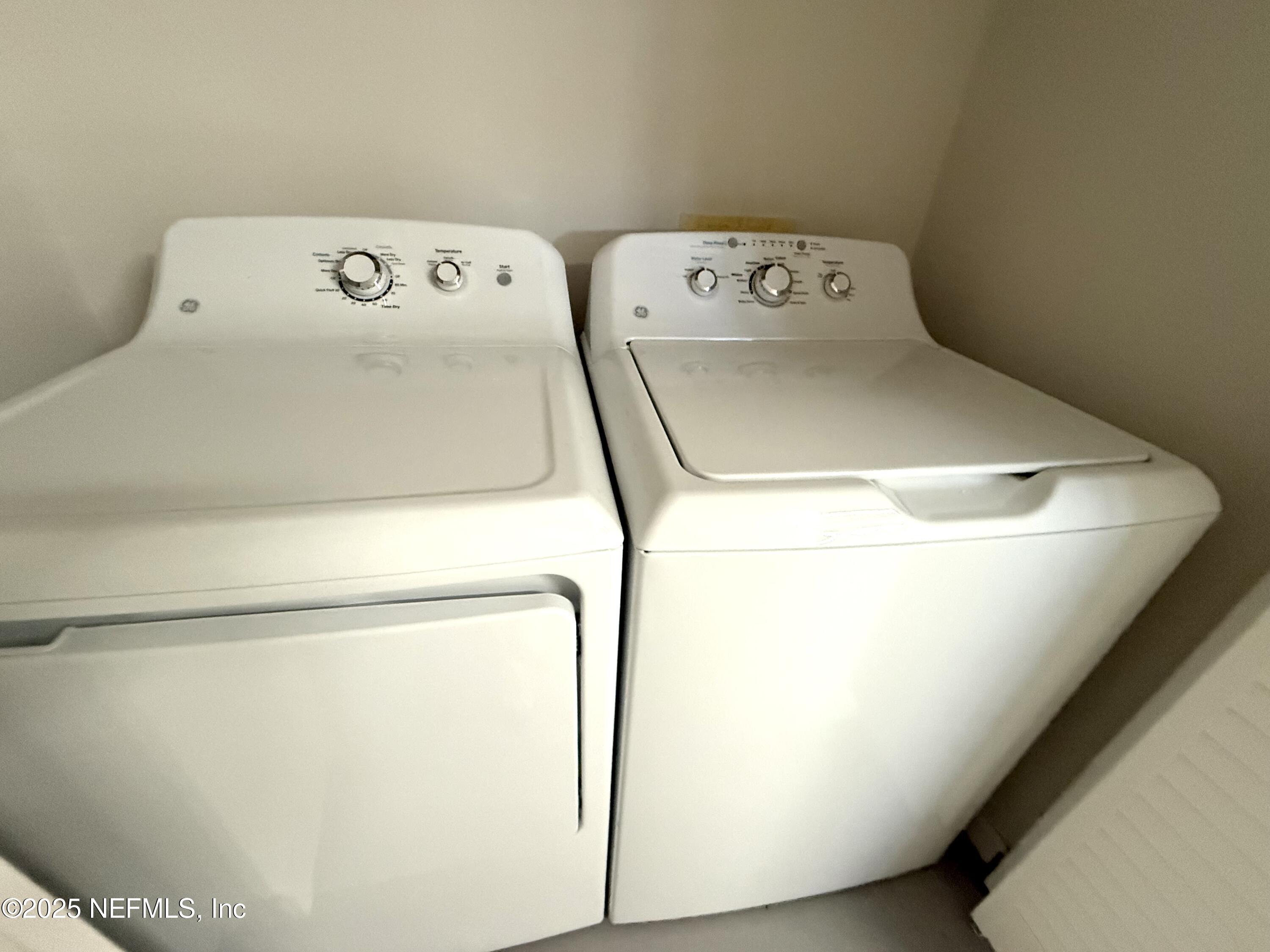 677 MacKenzie Circle St. Augustine, FL 32092 - Photo 61 of 92 a utility room with dryer and washer