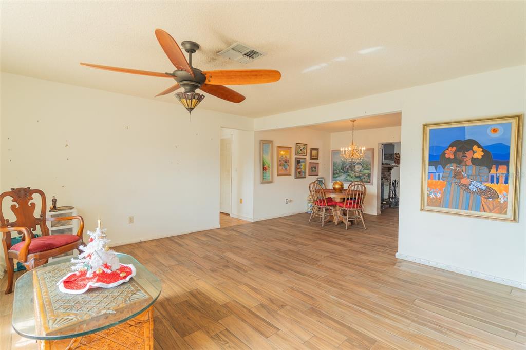 4202 Tangier Street Sebring, FL 33872 - Photo 15 of 29 a living room with furniture and kitchen view