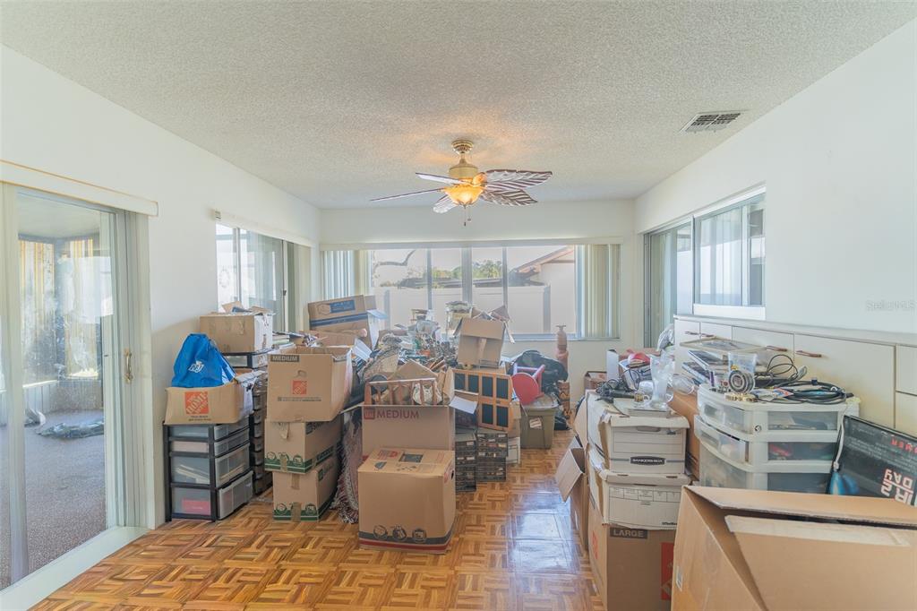 4202 Tangier Street Sebring, FL 33872 - Photo 17 of 29 a living room with furniture and a large window