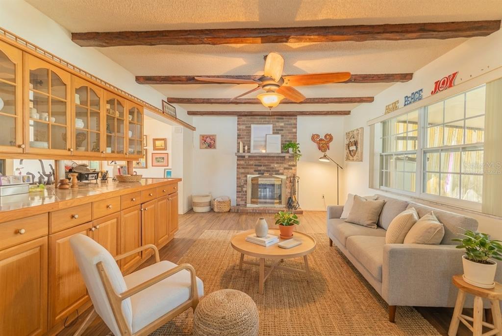 4202 Tangier Street Sebring, FL 33872 - Photo 2 of 29 a living room with furniture and a large window