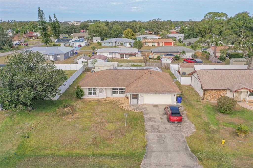 4202 Tangier Street Sebring, FL 33872 - Photo 29 of 29 an aerial view of residential houses with outdoor space and trees