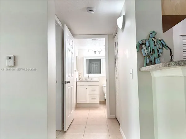 a bathroom with a bathtub and a sink