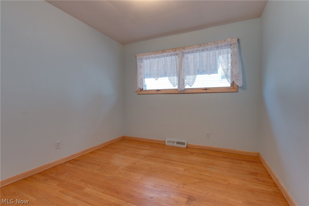 18116 Landseer Road Cleveland, OH 44119 - Photo 14 of 21 Second bedroom - beautiful hardwood floors...