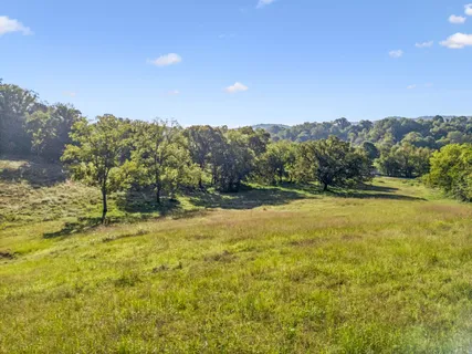 a view of a lake with mountains in the background
