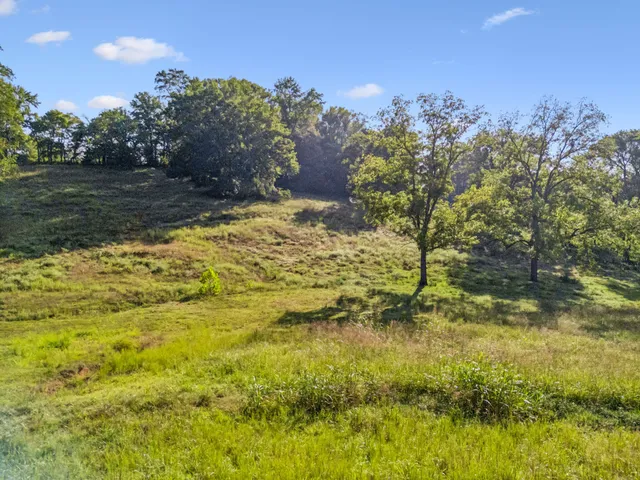 a view of a lake with mountains in the background