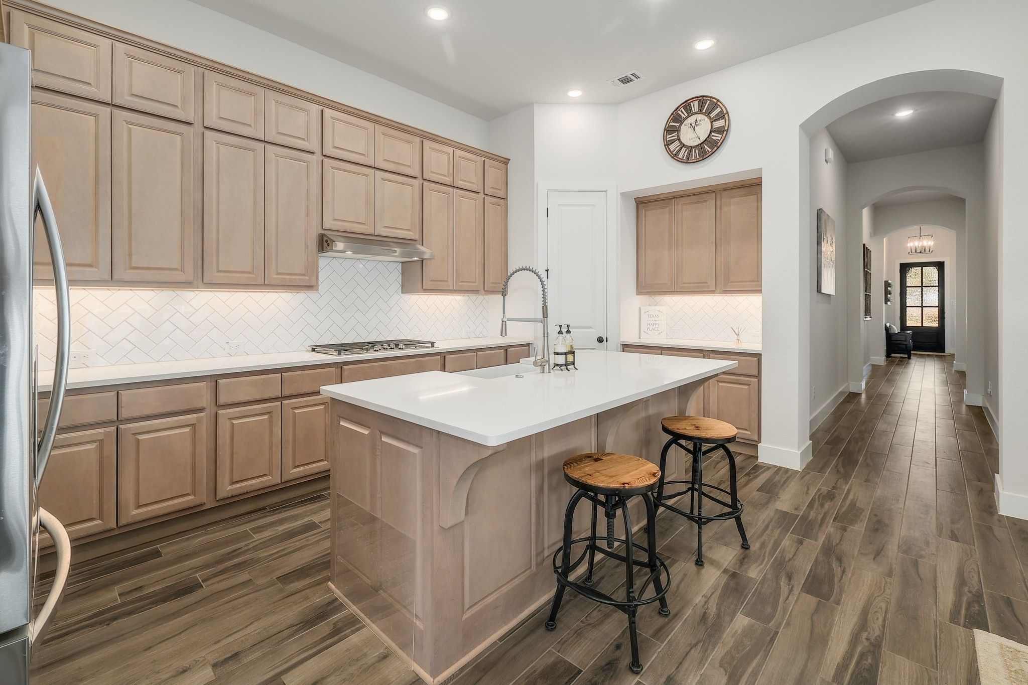 1304 Highcrest Georgetown, TX 78628 - Photo 11 of 32 a kitchen with a sink cabinets and wooden floor