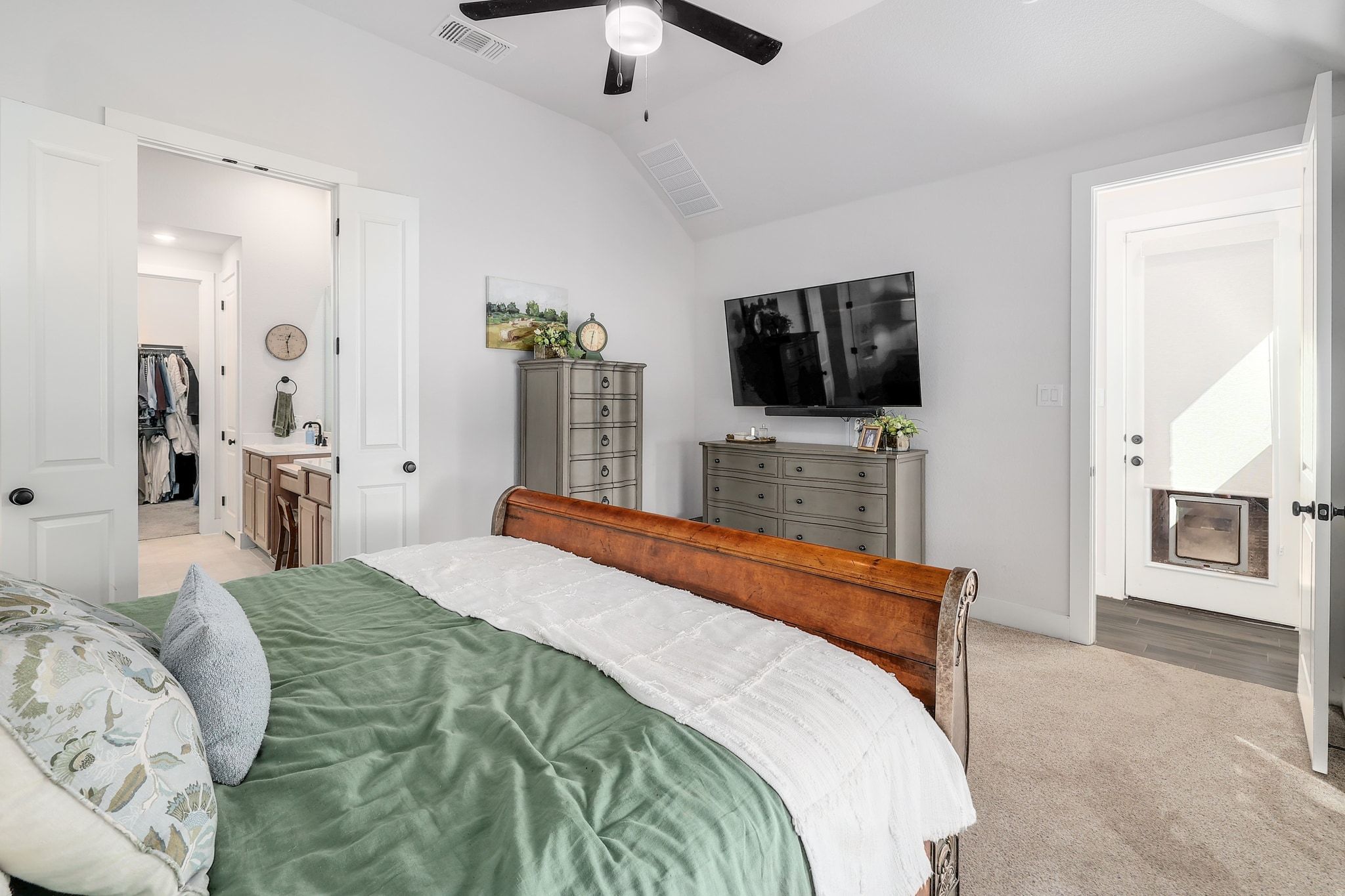 1304 Highcrest Georgetown, TX 78628 - Photo 15 of 32 a bedroom with a bed and a flat screen tv