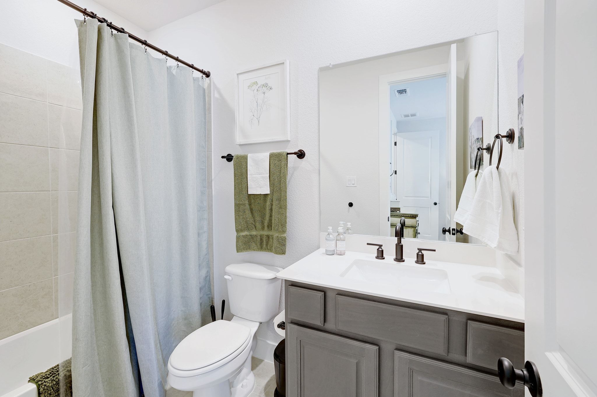 1304 Highcrest Georgetown, TX 78628 - Photo 26 of 32 a bathroom with a sink a toilet a mirror and shower