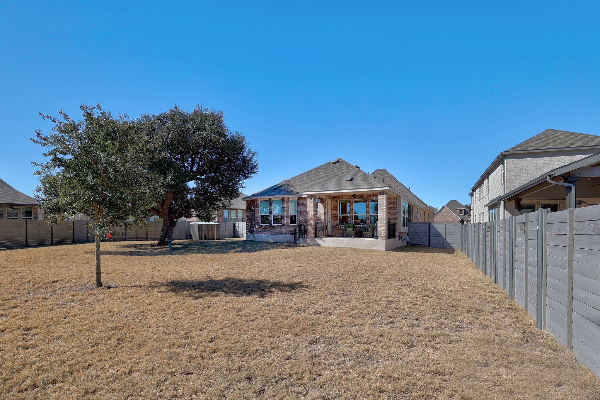 1304 Highcrest Georgetown, TX 78628 - Photo 31 of 32 a front view of a house with a yard