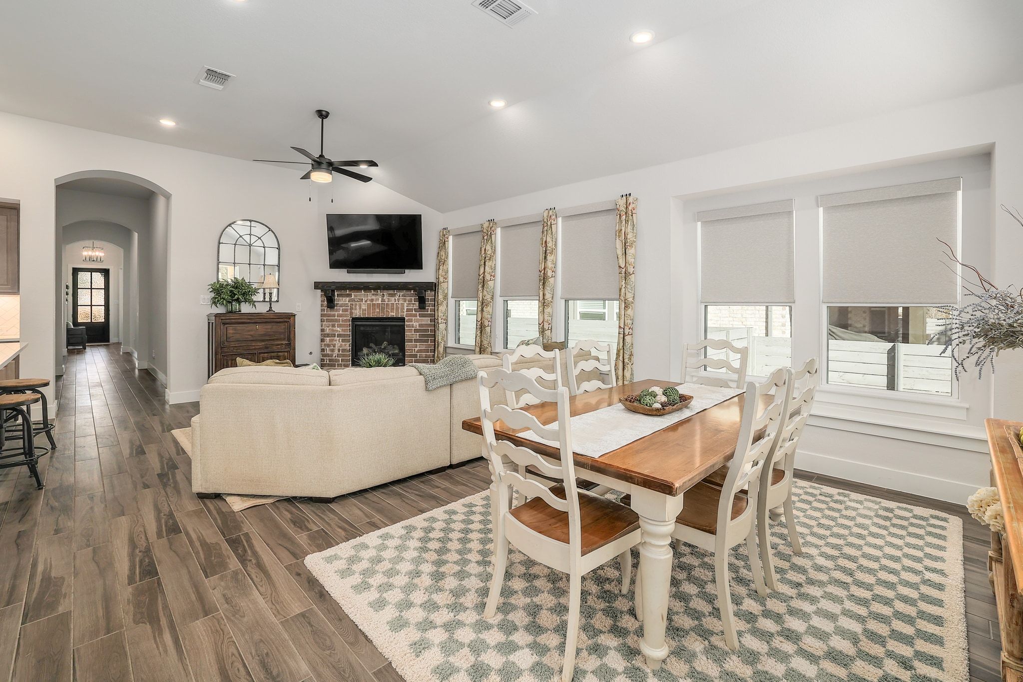 1304 Highcrest Georgetown, TX 78628 - Photo 9 of 32 a living room with a fireplace a flat screen tv and a fireplace