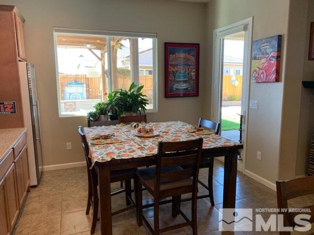 9547 Tencendur Lane Reno, NV 89521 - Photo 6 of 39 a view of a dining room with furniture and window