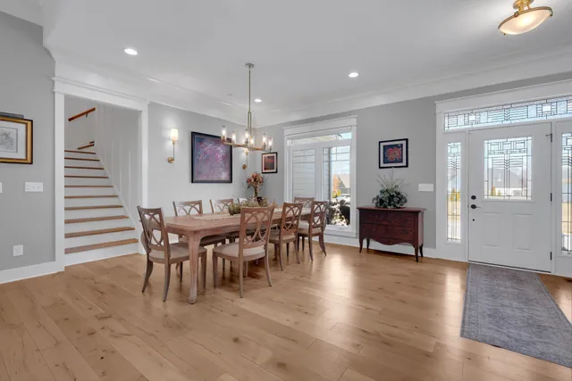 a spacious bedroom with a bed and a ceiling fan