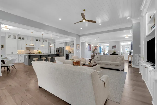 a bathroom with a granite countertop toilet sink and mirror