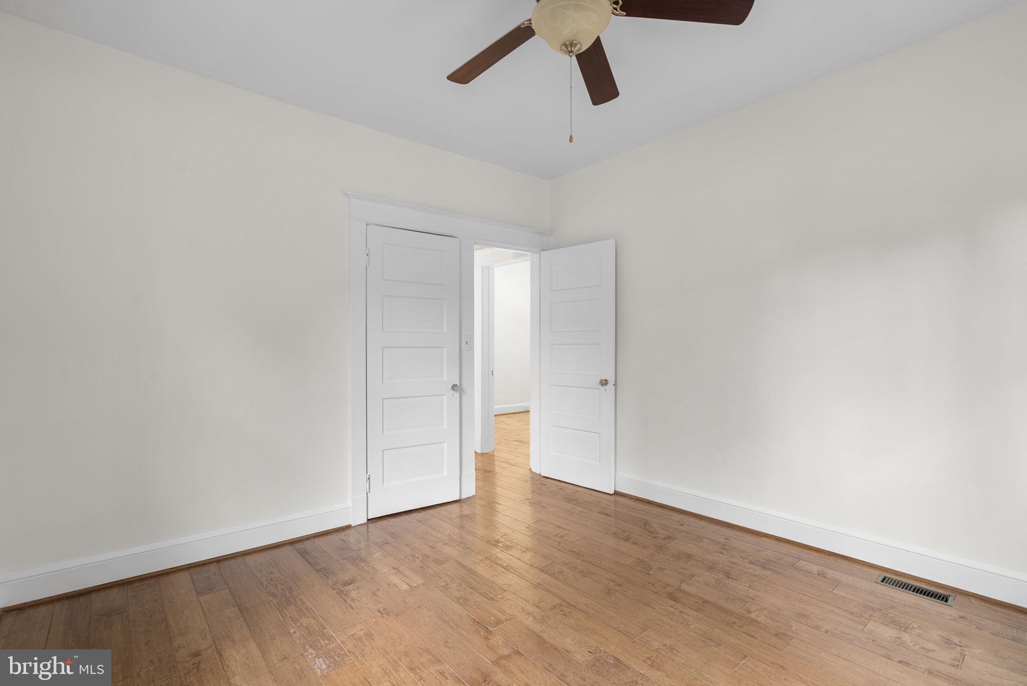 9120 Glenridge Road Silver Spring, MD 20910 - Photo 26 of 59 a view of empty room with wooden floor