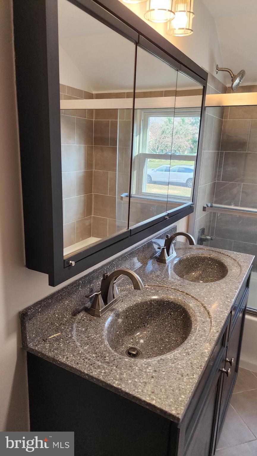 213 Upper Valley Road North Wales, PA 19454 - Photo 14 of 28 a bathroom with a granite countertop sink and a mirror